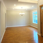 Laminate flooring installed in a bright hallway – Port Coquitlam project