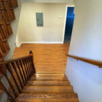 Modern hardwood flooring viewed from upstairs in a Port Coquitlam home